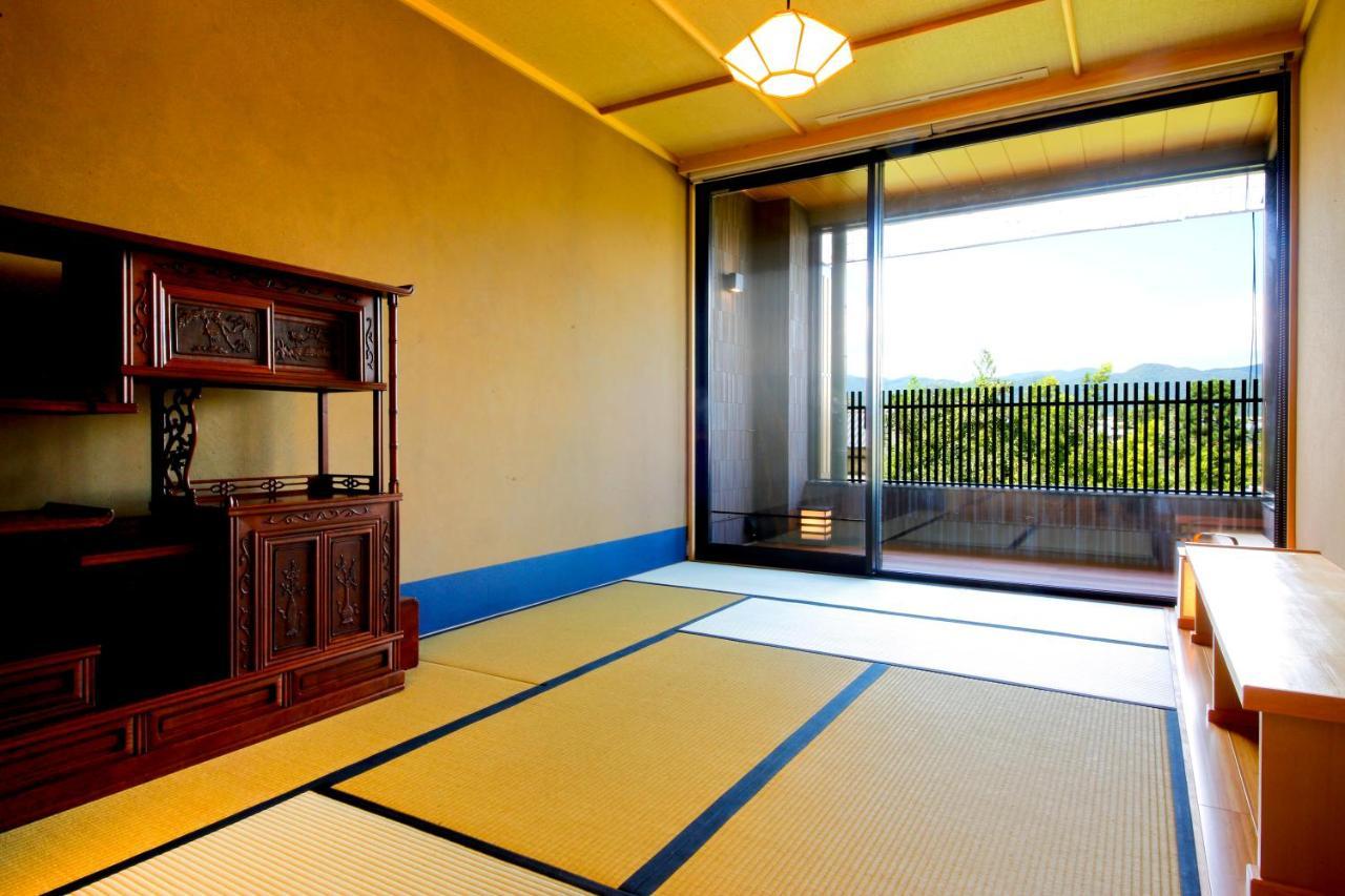 Kyoto Arashiyama Onsen Ryokan Togetsutei Buitenkant foto